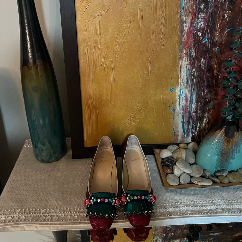 Christian Louboutin Oaxacana green and fuchsia, with golden heel.